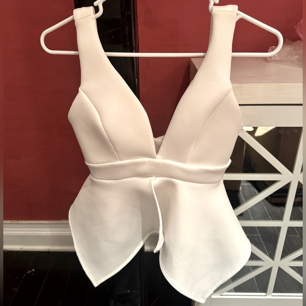Peplum Top in white size small.